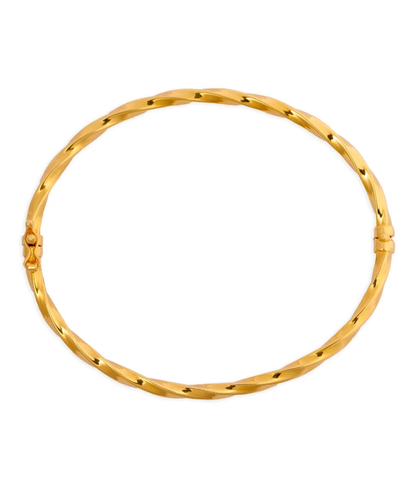 Złota bransoletka typu bangle, zapinana na skobelek. Bransoletka o skręconej formie, 585.