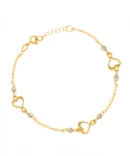 Bransoletka złota z serduszkami - żółte i białe złoto