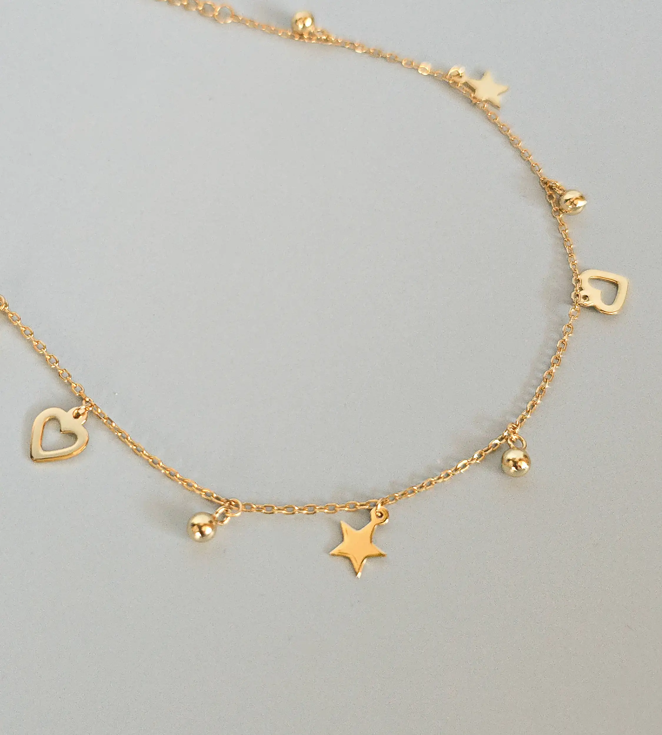 Bransoletka na nogę srebro pozłacane charmsy