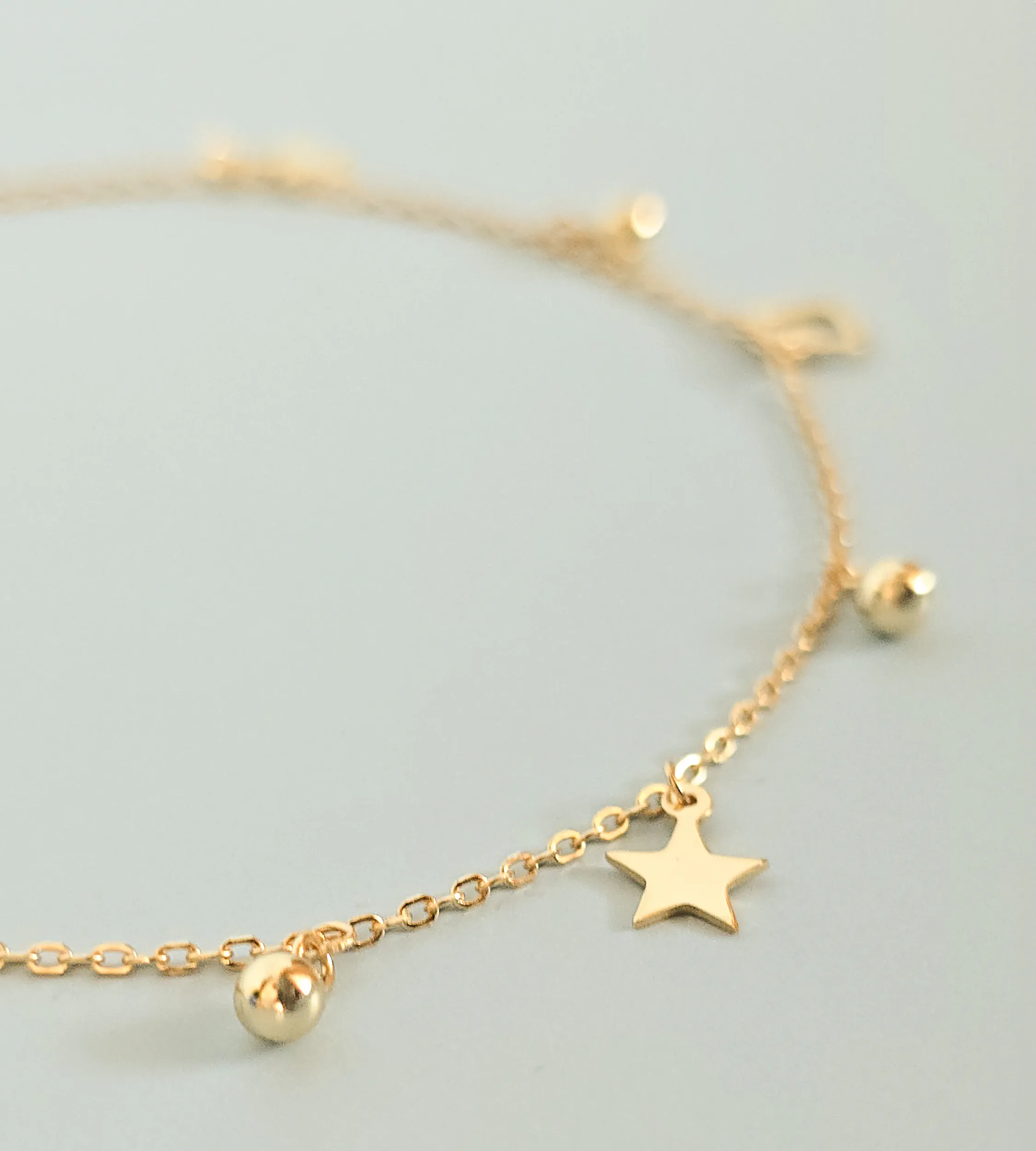 Bransoletka na nogę srebro pozłacane charmsy