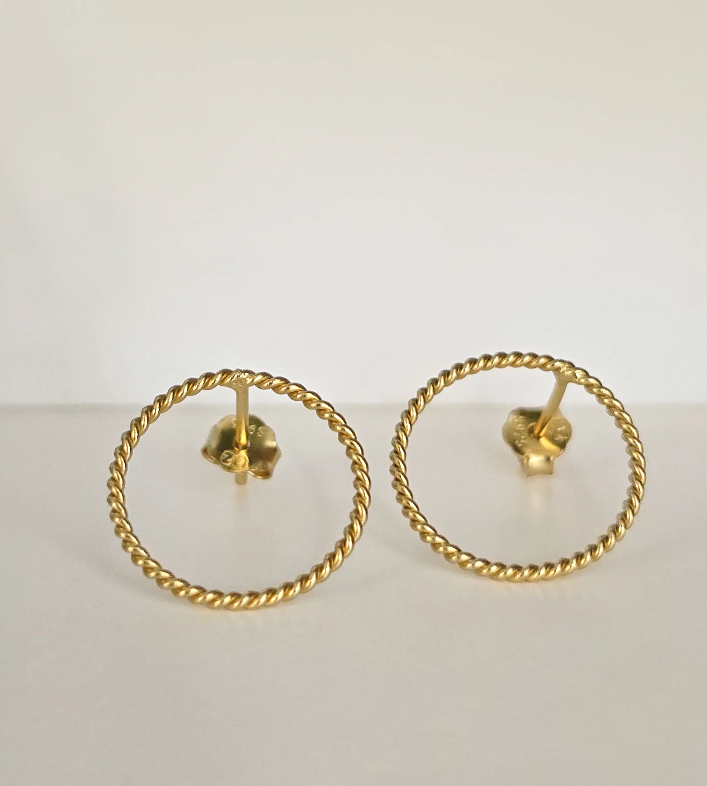 Kolczyki skręcone koła srebrne pozłacane