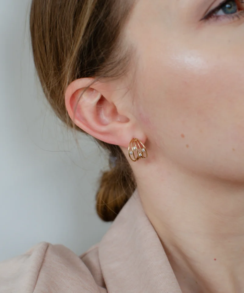 Złote kolczyki potrójne cyrkonie