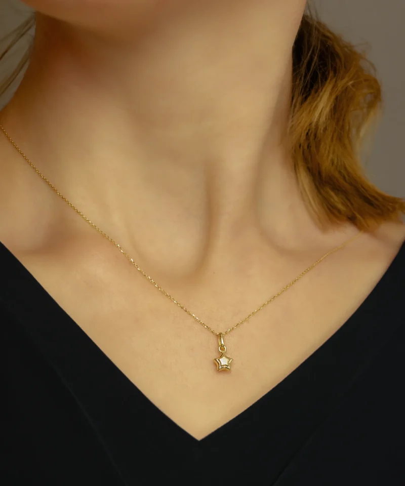 Złota zawieszka gwiazdka mała